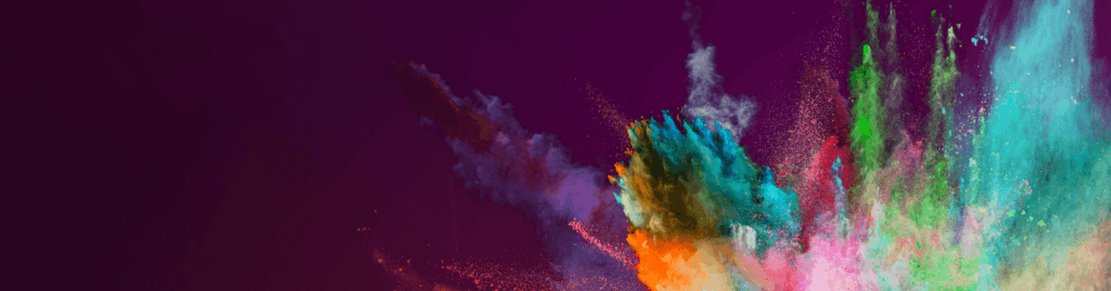 Colored powder explosion on dark gradient background.